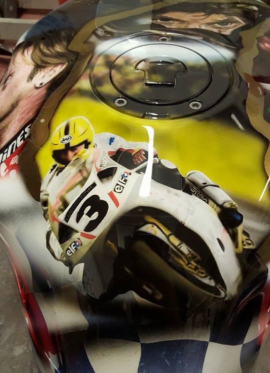 Airbrushed Painting of Isle of Man TT race with white motorbike rider